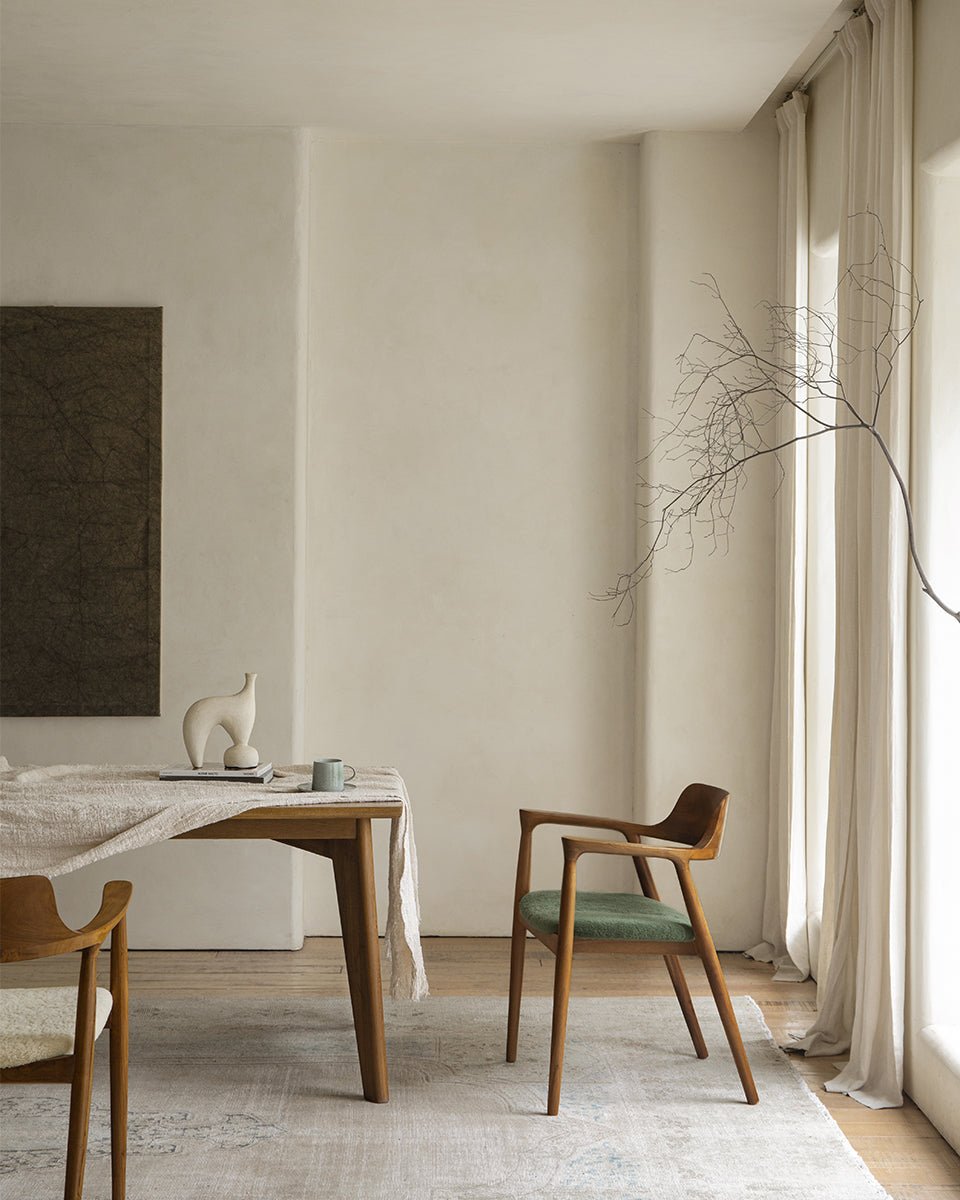 Hiroshima Chair in dining room, solid wood frame with green seat, modern design, elegant living space