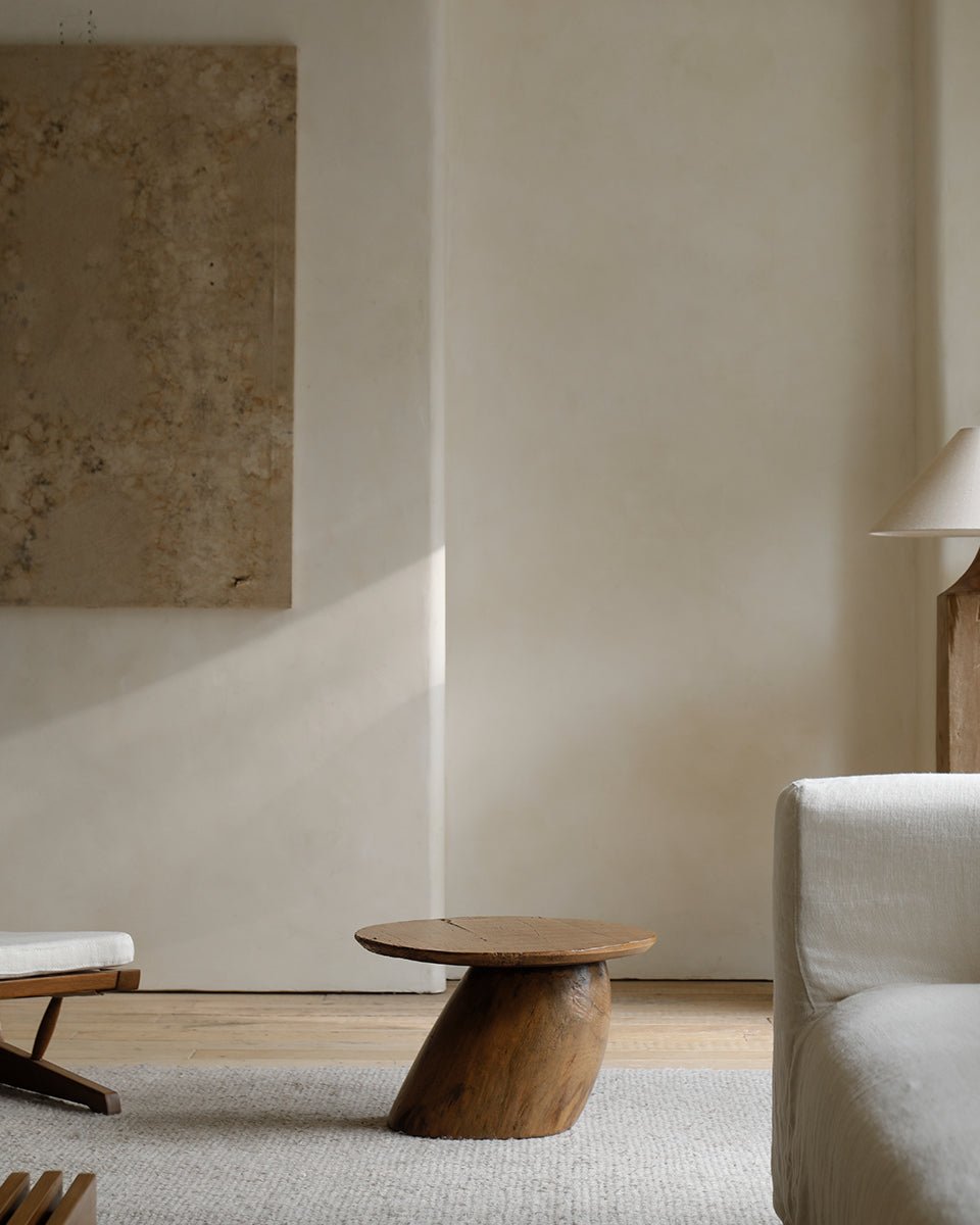 Alva Side Table in natural wood with distorted base, organic design and curved surfaces. Featuring natural wood