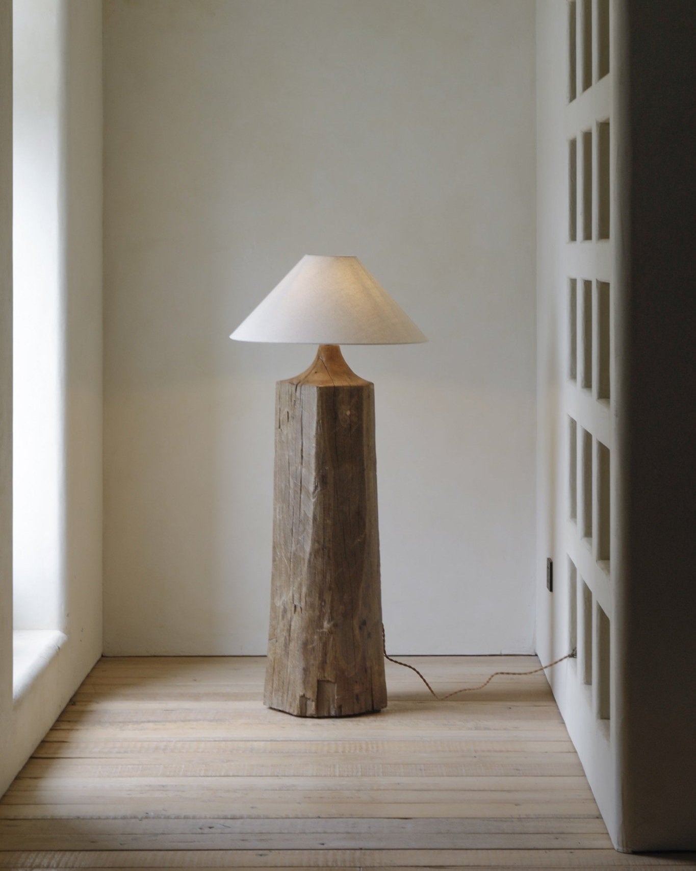 Wooden floor lamp with linen shade, minimalist design, Chinese Plug Type A, adds cozy lighting.