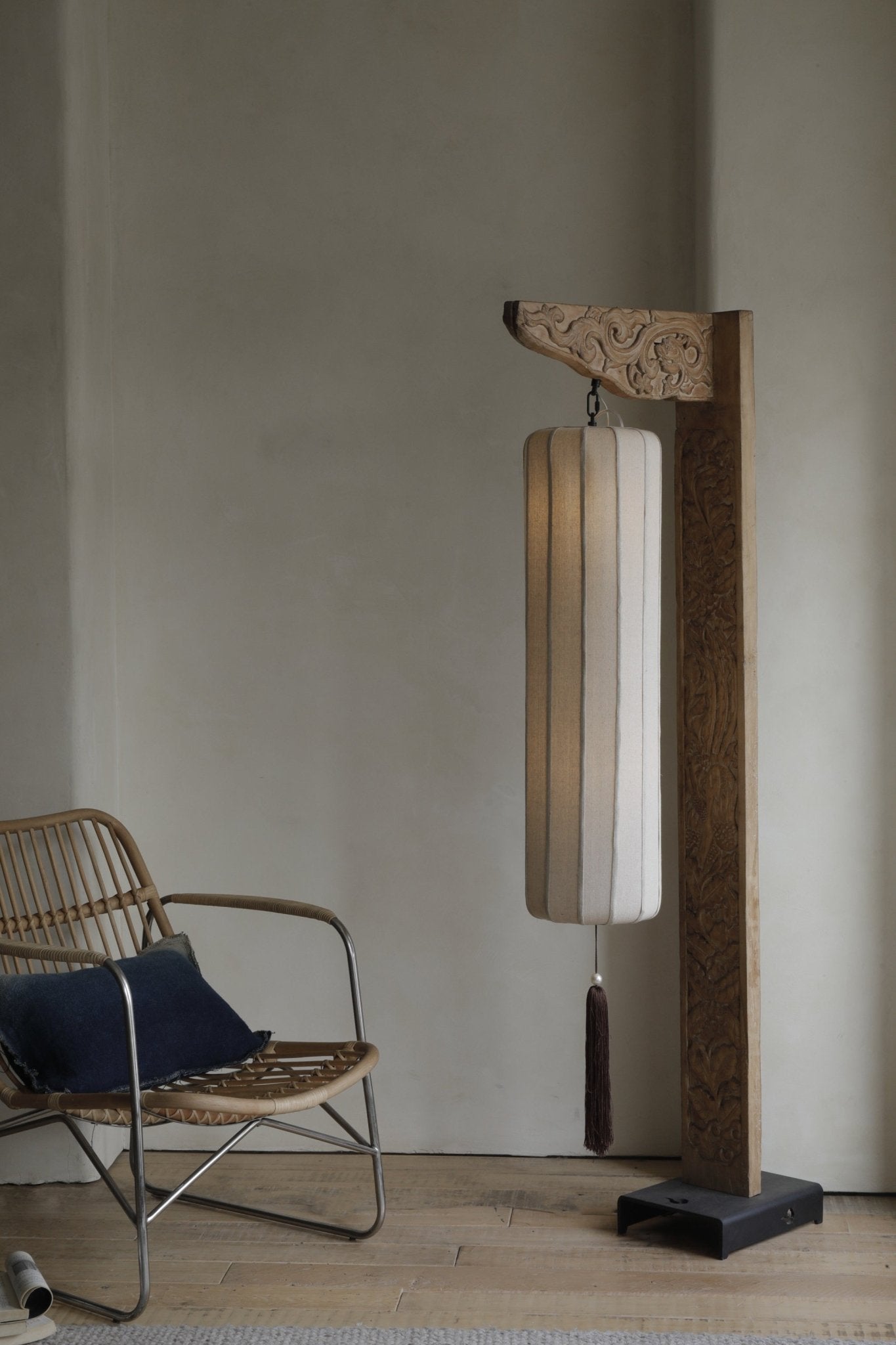 Chinese floor lamp with wooden frame and fabric lampshade. Oriental style home decor