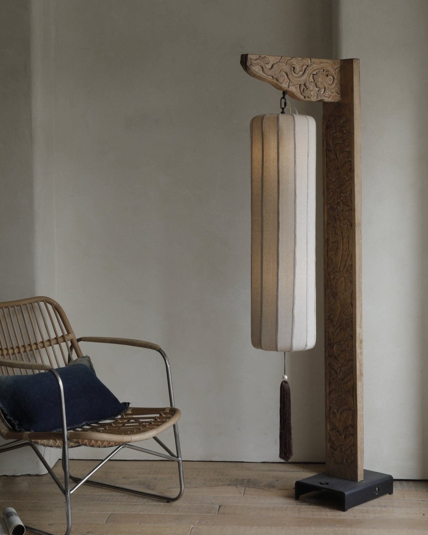 Chinese floor lamp with wooden frame and fabric lampshade. Oriental style home decor