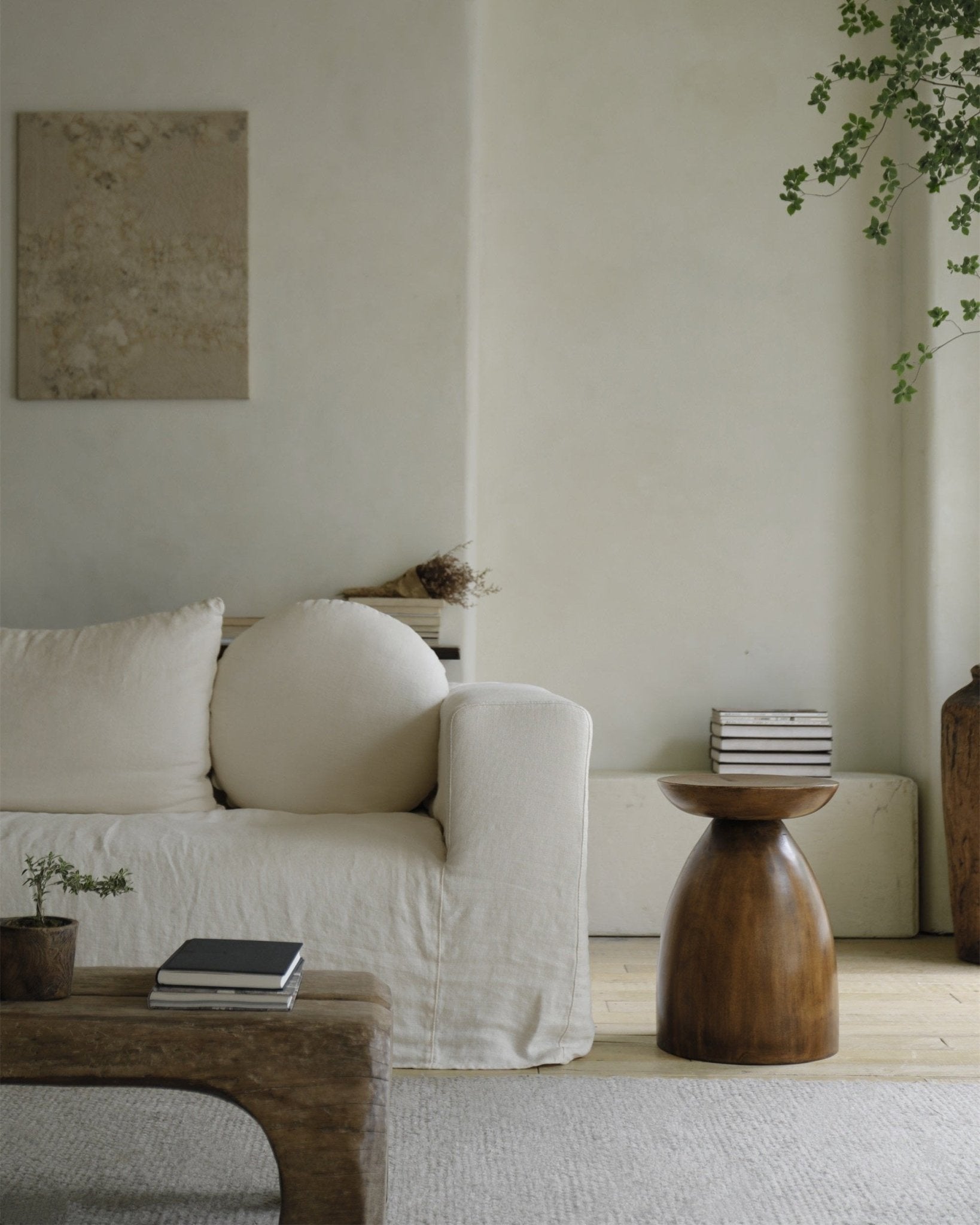 Wooden Samanea saman side table and coffee table in minimalist living room setting