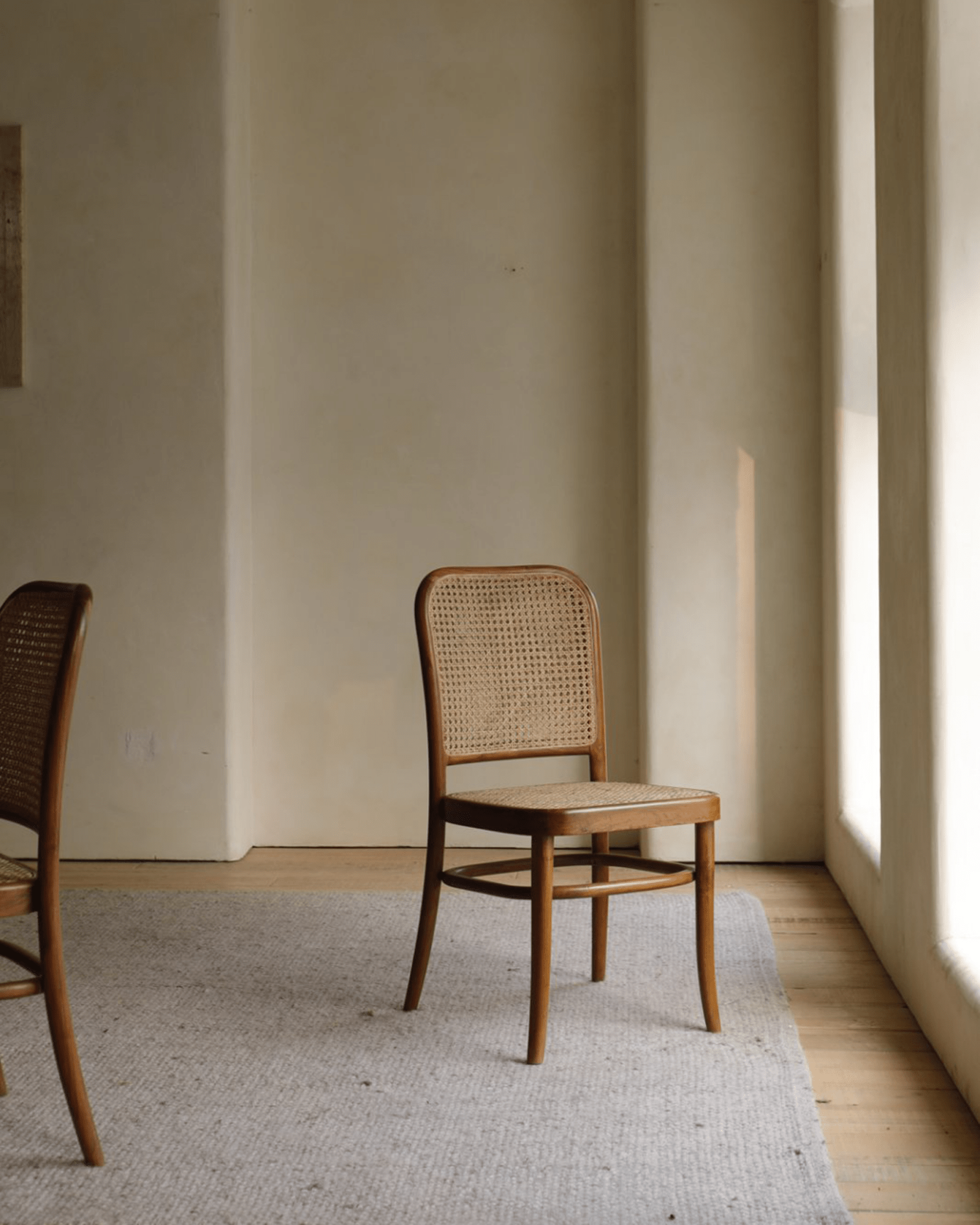 NO.811 Chair, teak frame, natural rattan weaving, mid-century design. Ideal for versatile use in any interior.