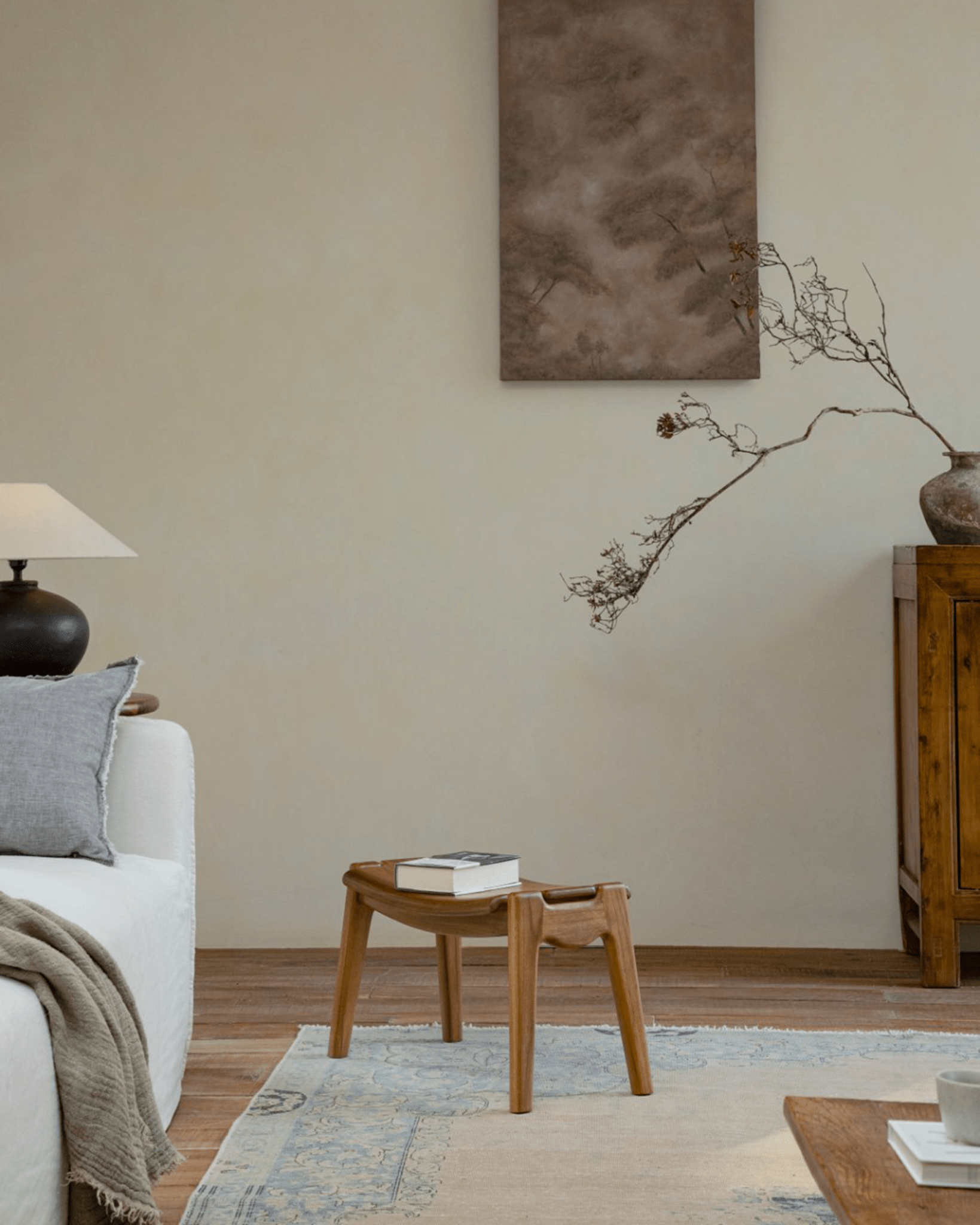 Zen footstool in minimalist living space, enhancing the ambiance of a relaxation-focused interior. Ideal with Zen Armchair.