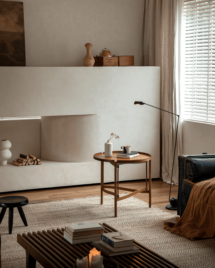 Hansen Tray Side Table with vase and cup in a stylish modern living room