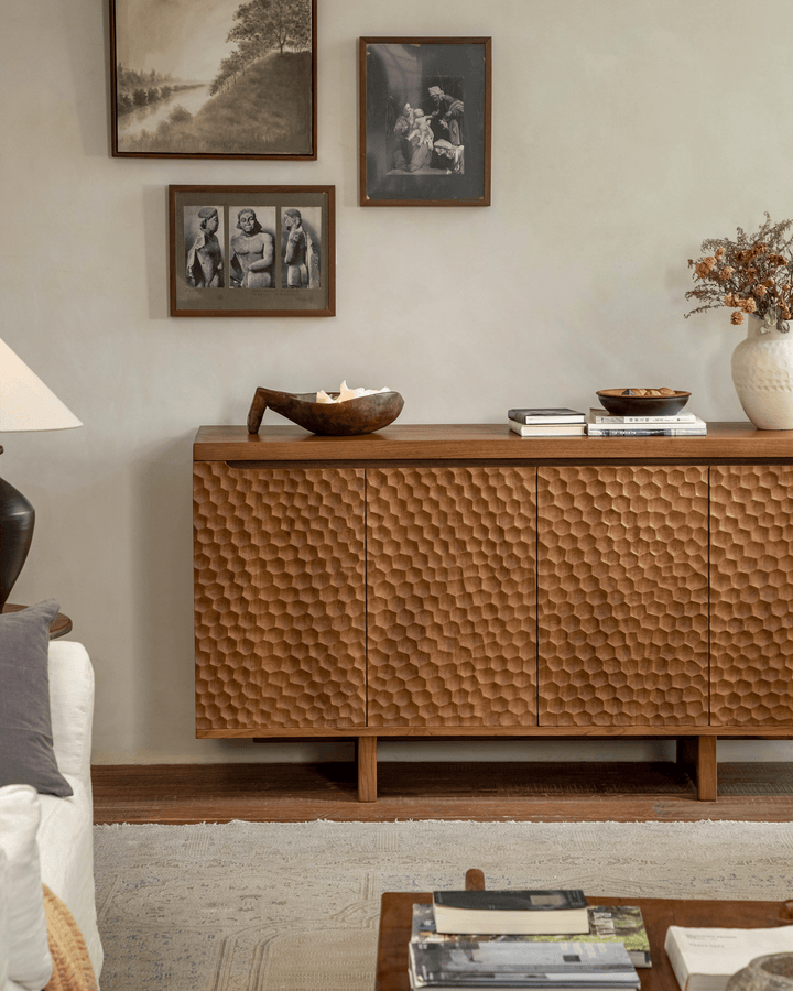 Textured honeycomb sideboard in a stylish living room with decor and artwork.