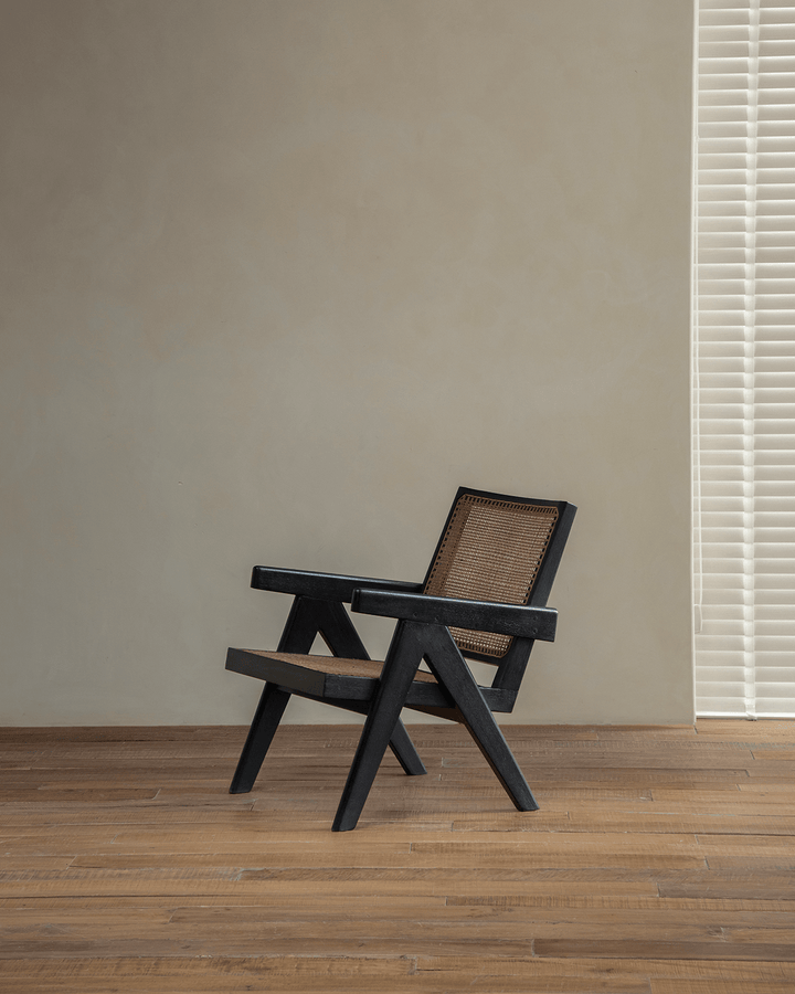 Chandigarh Armrest Easy Chair in carbonized black with woven cane backrest