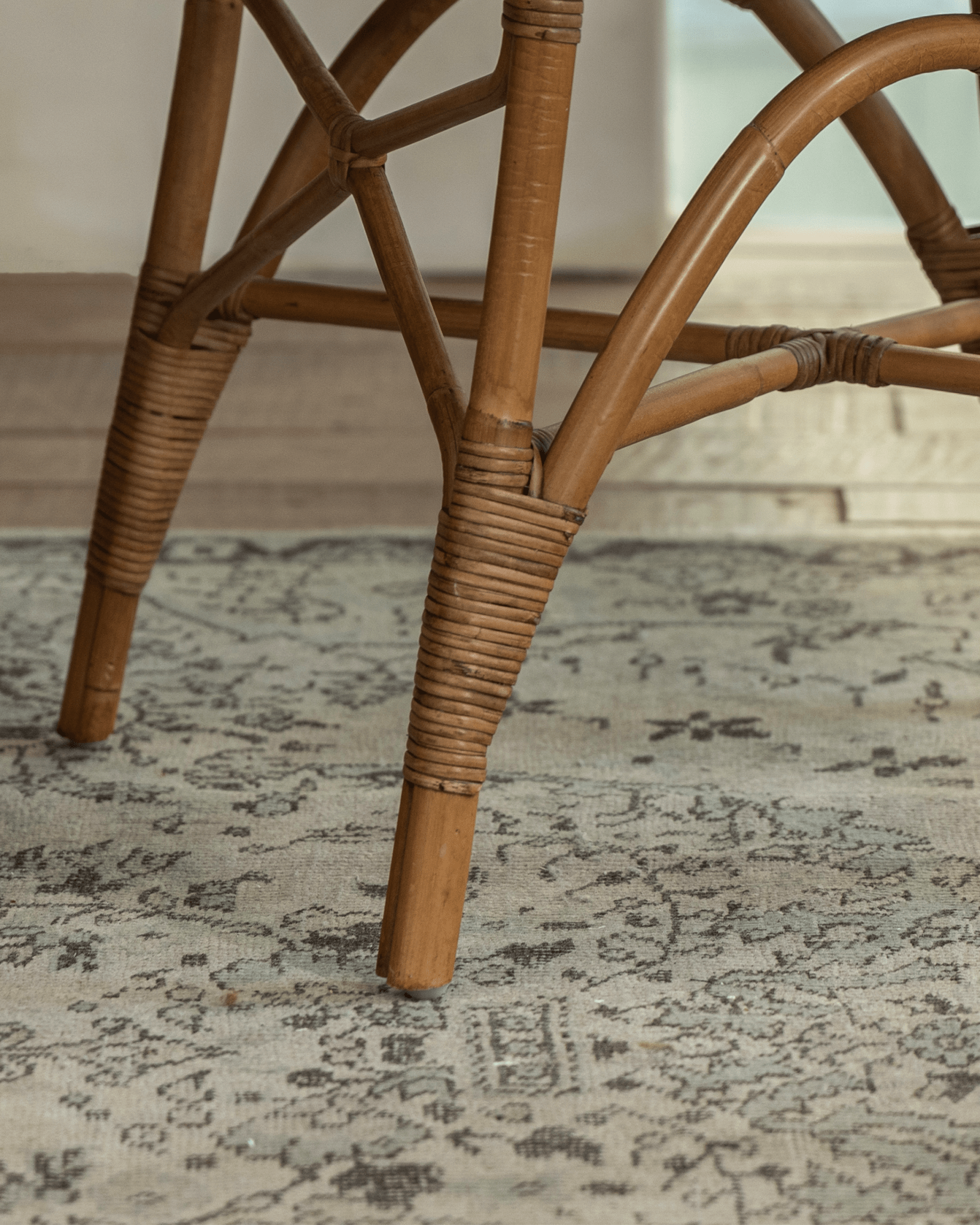 Areca Rattan Chair leg detail, handwoven rattan joints, natural design, comfortable and lightweight furniture.