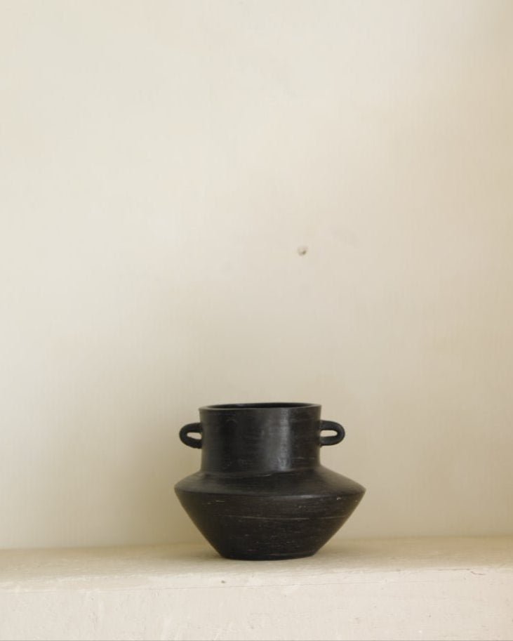 Black ceramic vase with handles, minimalist design for home decor