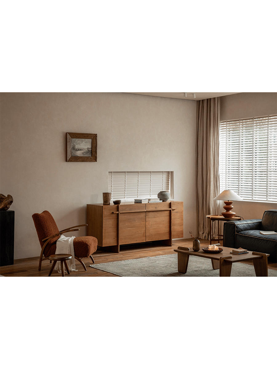 NO.42 Teak Sideboard in a living room setting, showing versatile storage, natural wood, and elegant design.