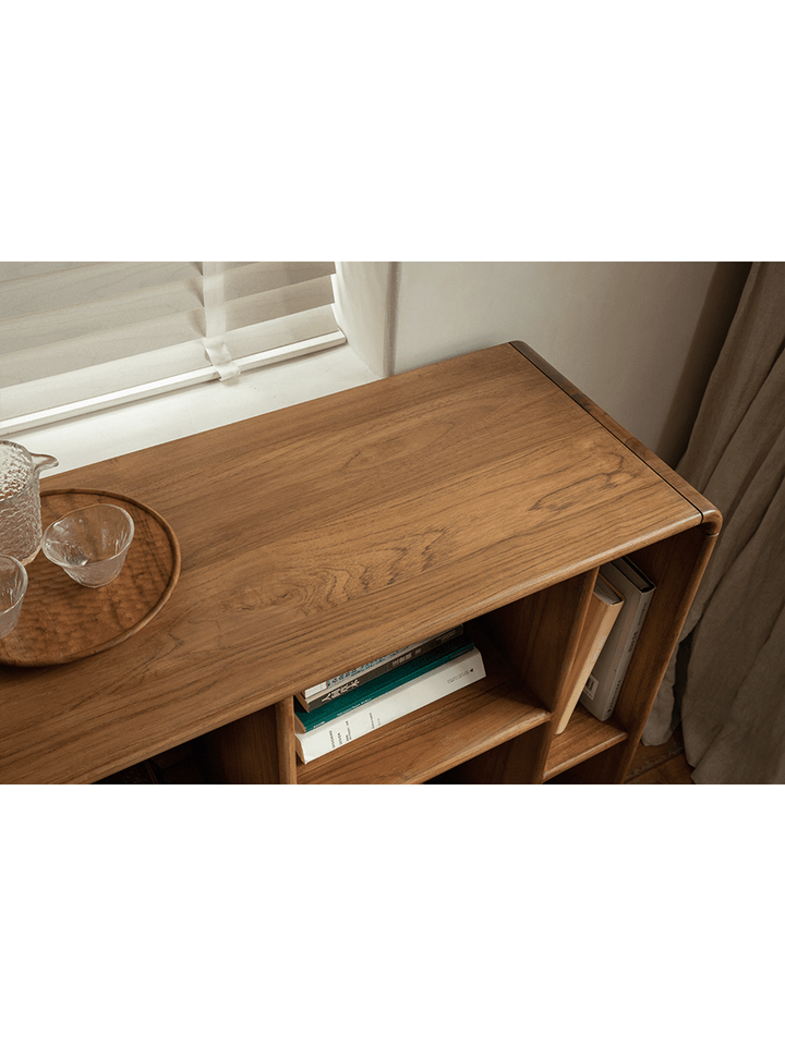Top view of Klotski Modular Bookcase highlighting warm wood finish and decorative tray.