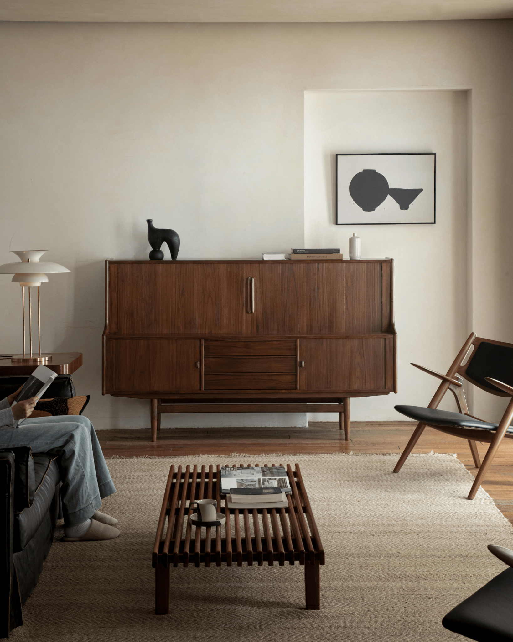 Ibu Teak Sideboard in a living room setting, modern design with teak wood, drawers and doors