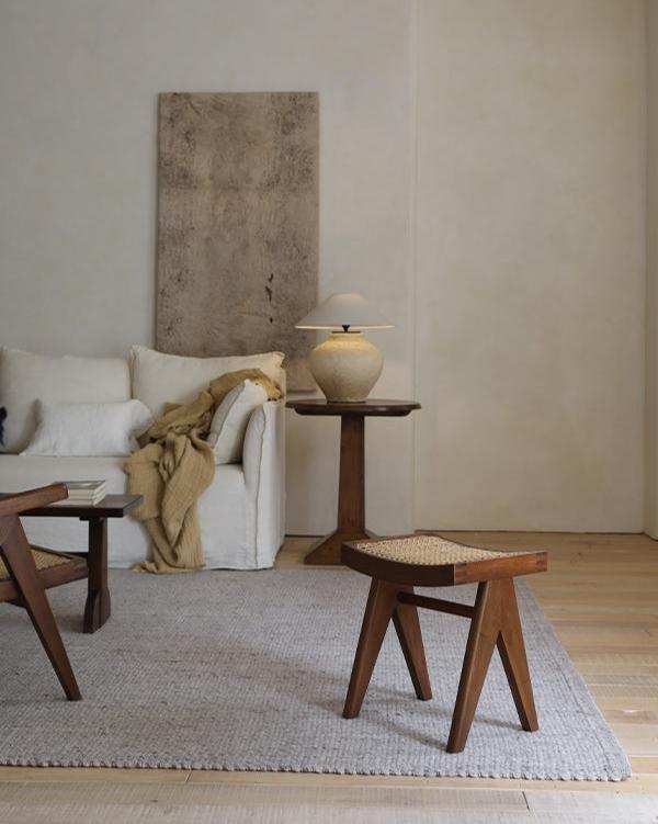 Chandigarh Easy Stool in a modern minimalist living room decor