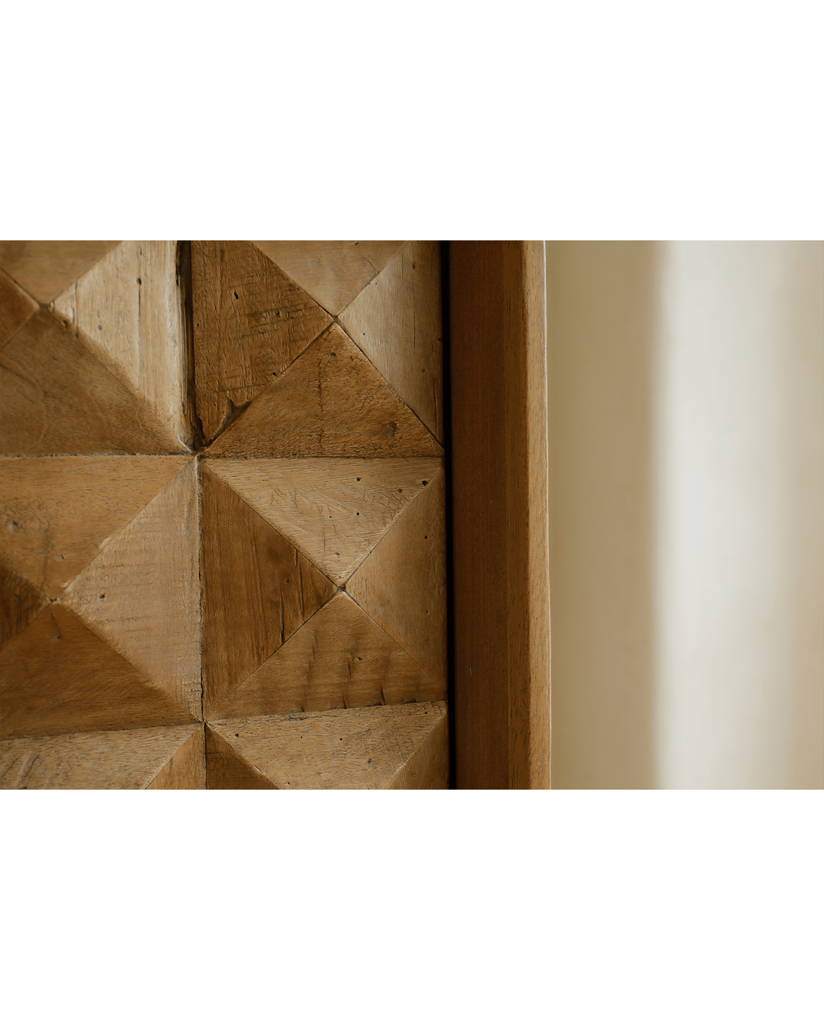 Close-up Bumpy Sideboard with geometric design in reclaimed wood, modern living room furniture