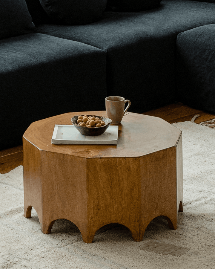 Decagon Side Table in wood finish with bowl and cup on top