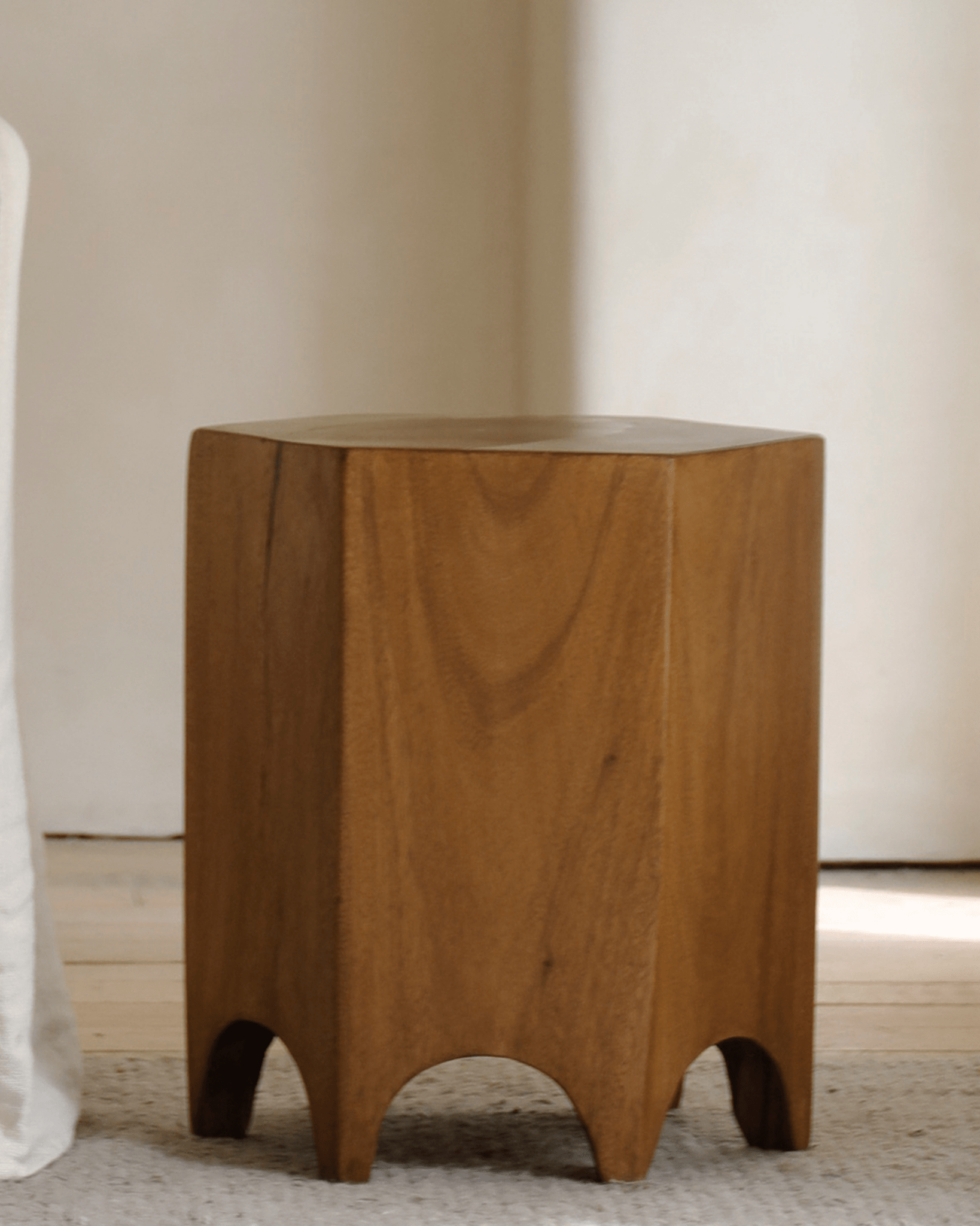 Hexagon Side Table in natural wood finish, versatile as stool or accent piece.