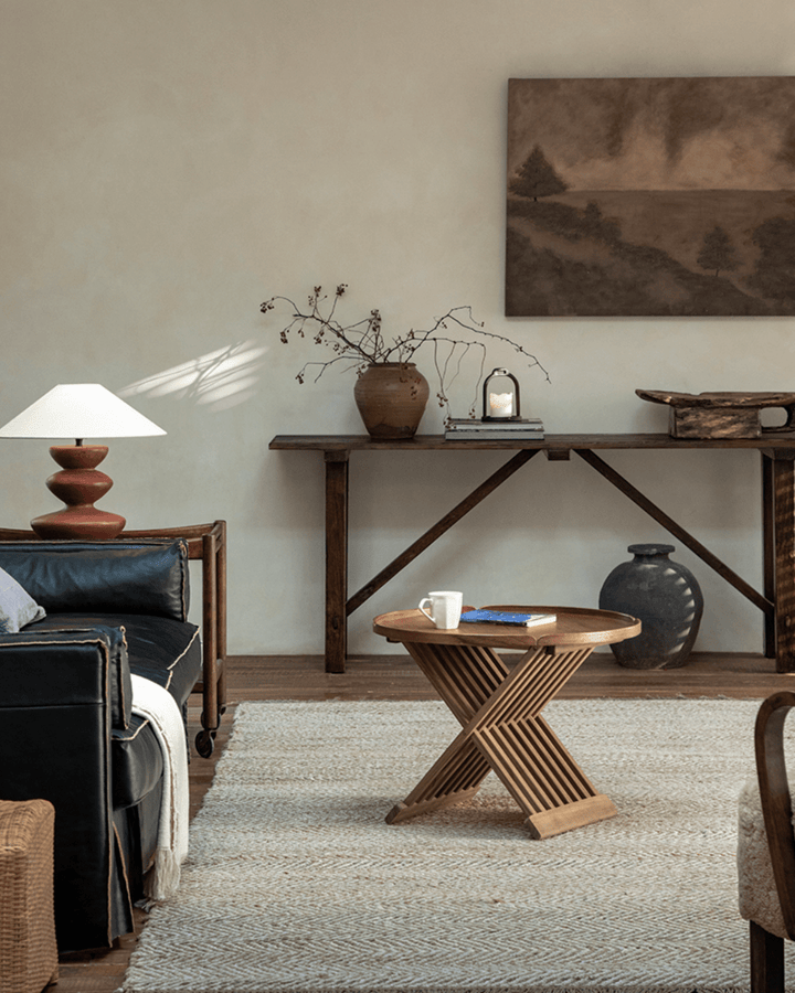Stylish living room with a modern folding coffee table and natural textures