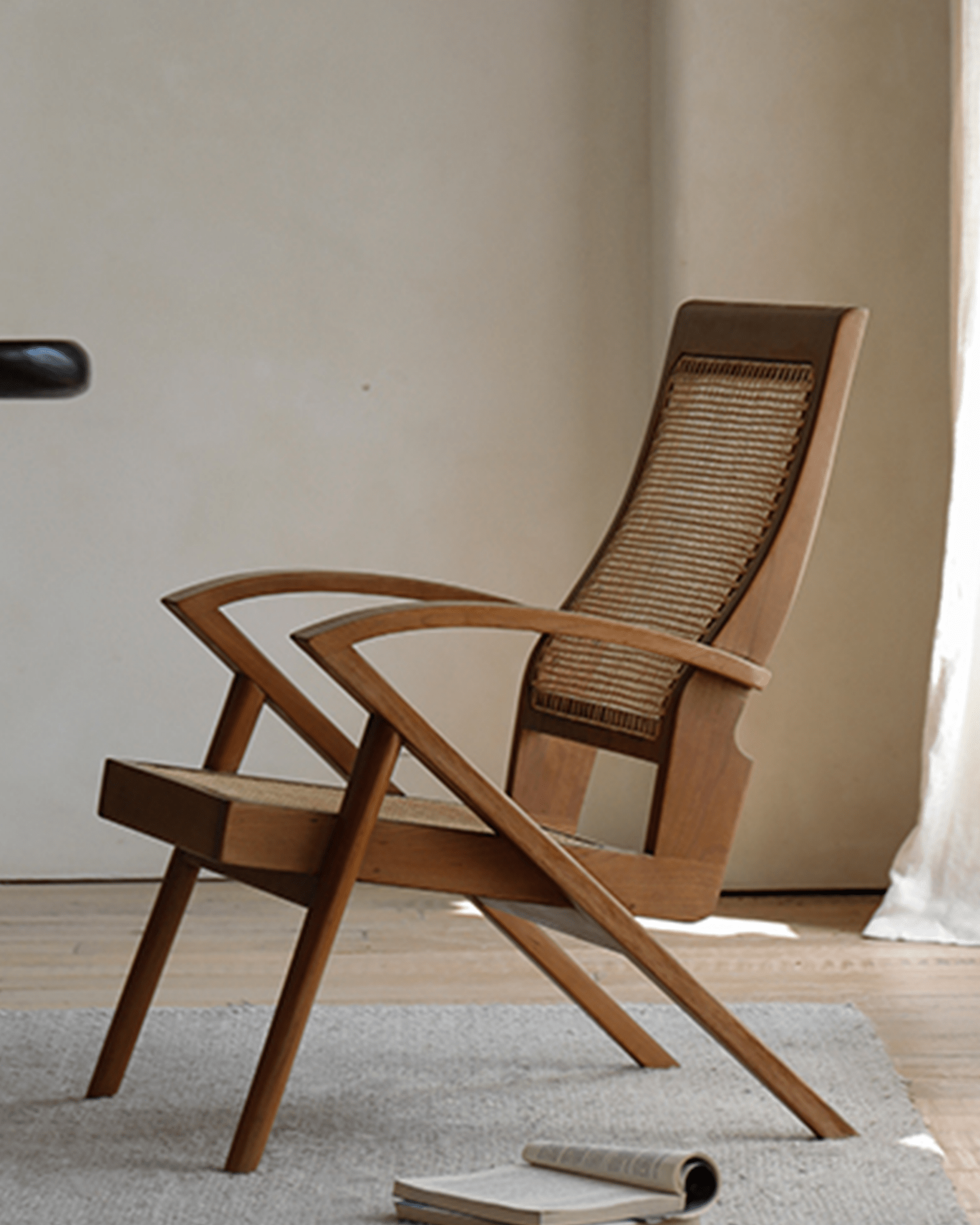Rex Easy Chair made of teak wood with handwoven rattan. Vintage inspired lounge chair.