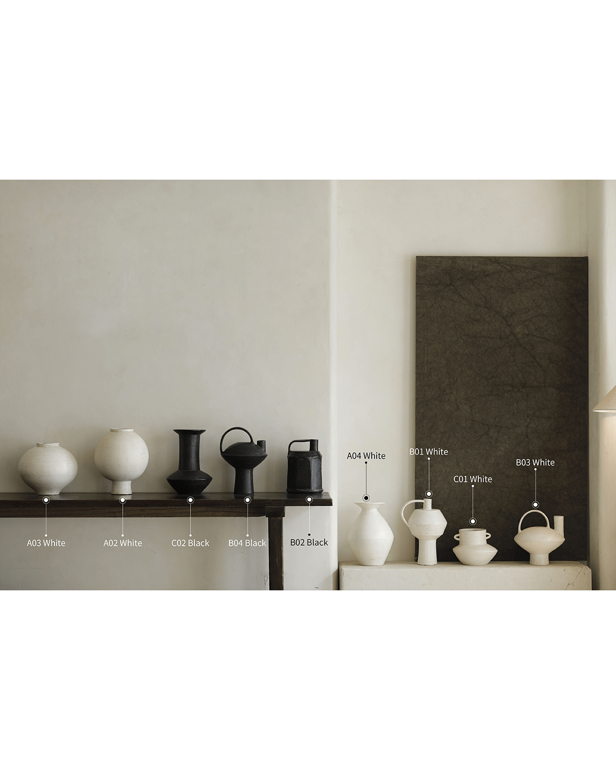 Variety of ceramic vases in white and black, perfect for home decor.