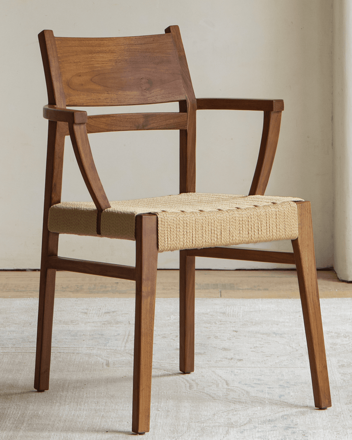 Hug Chair with wooden frame and woven seat in natural fibers