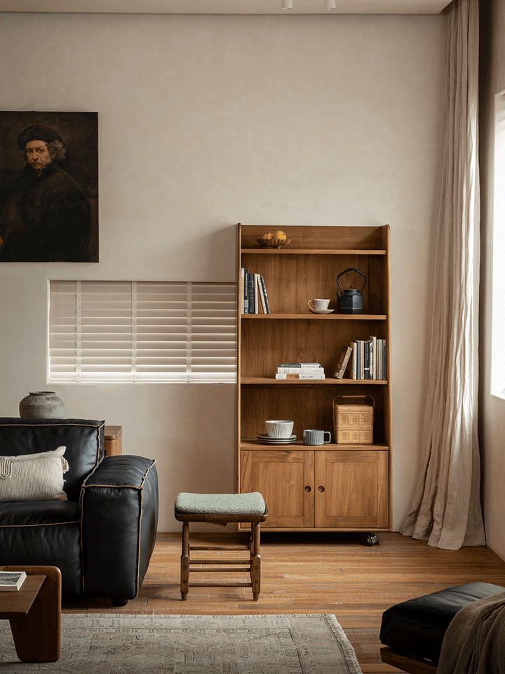 Lidi Display Cabinet in living room, featuring teak wood and stylish decor accents.