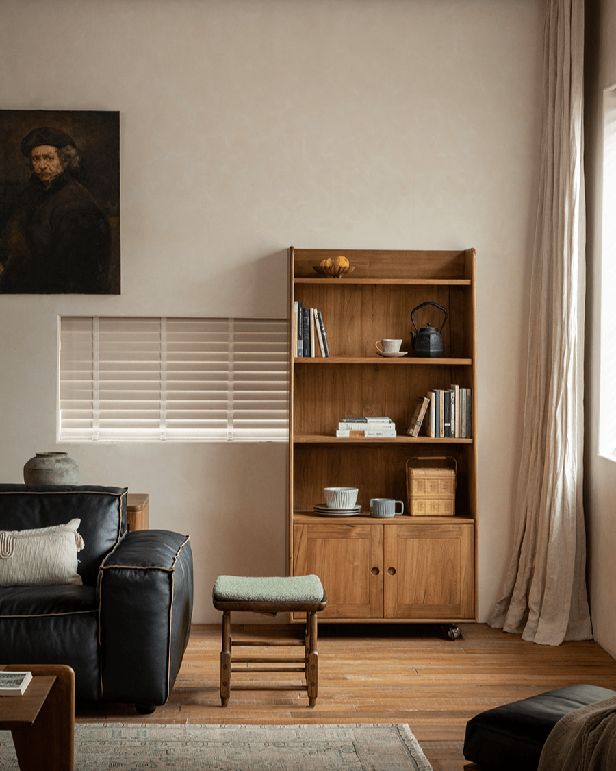 Lidi Display Cabinet in teak wood, styled in a modern interior with books and decor.