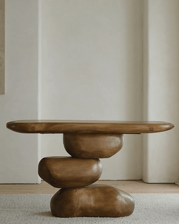 Sculptural wooden console table with rounded edges and organic shapes