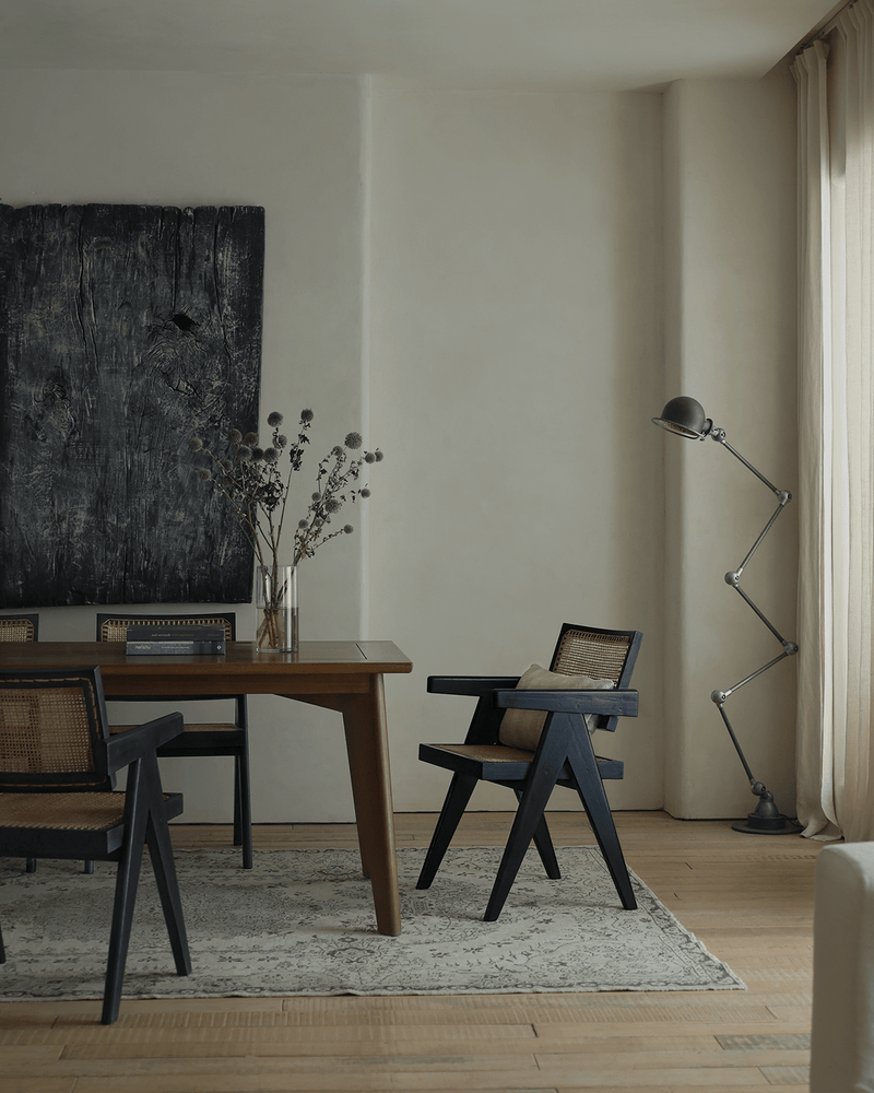Chandigarh office chair in a chic living room with wooden table and stylish decor.