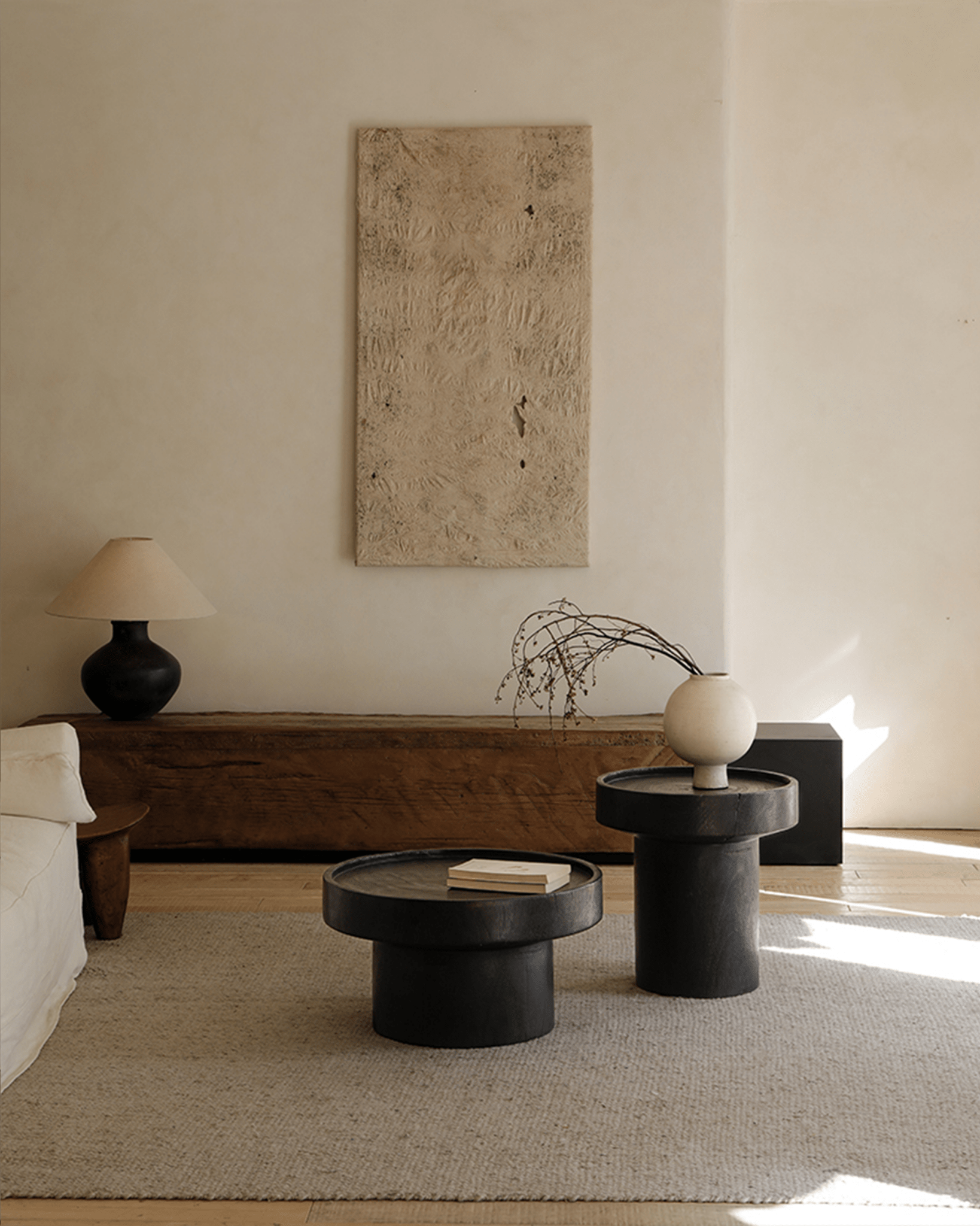 Carbonized black Stamp Coffee Table, modern living room with sculptural design