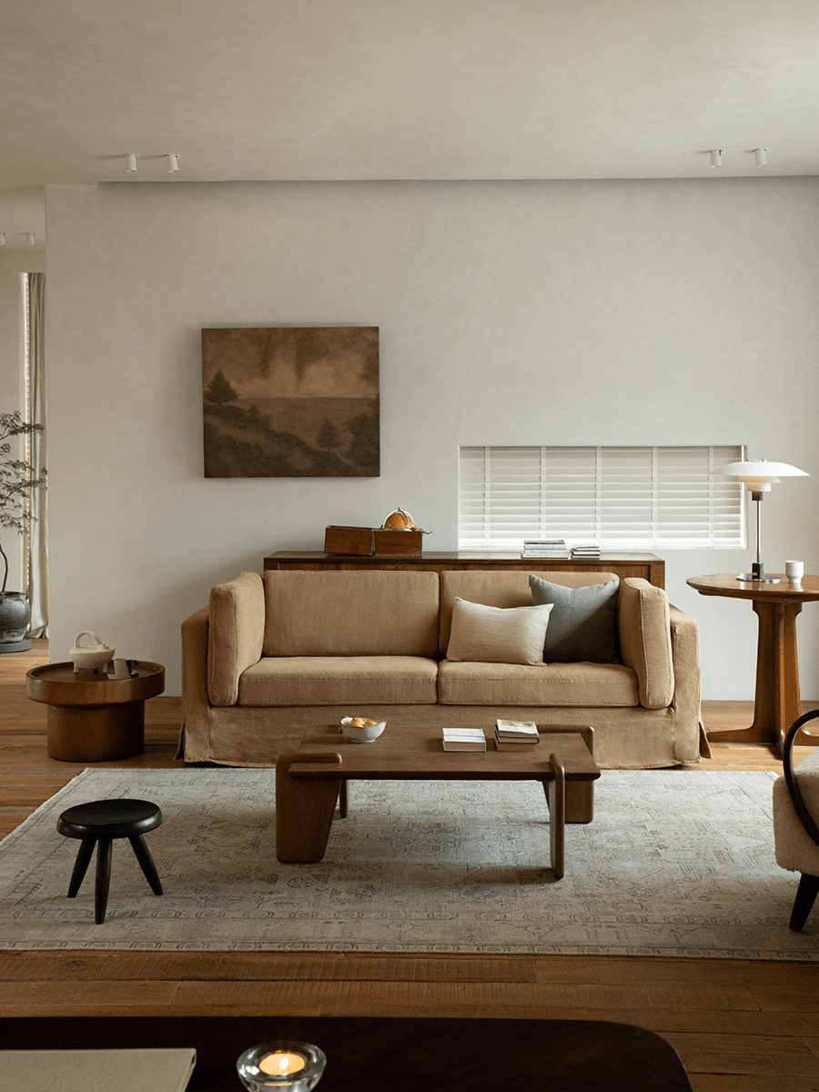 Beige Skirt Linen Sofa in a modern living room setting, linen fabric, peaceful atmosphere.