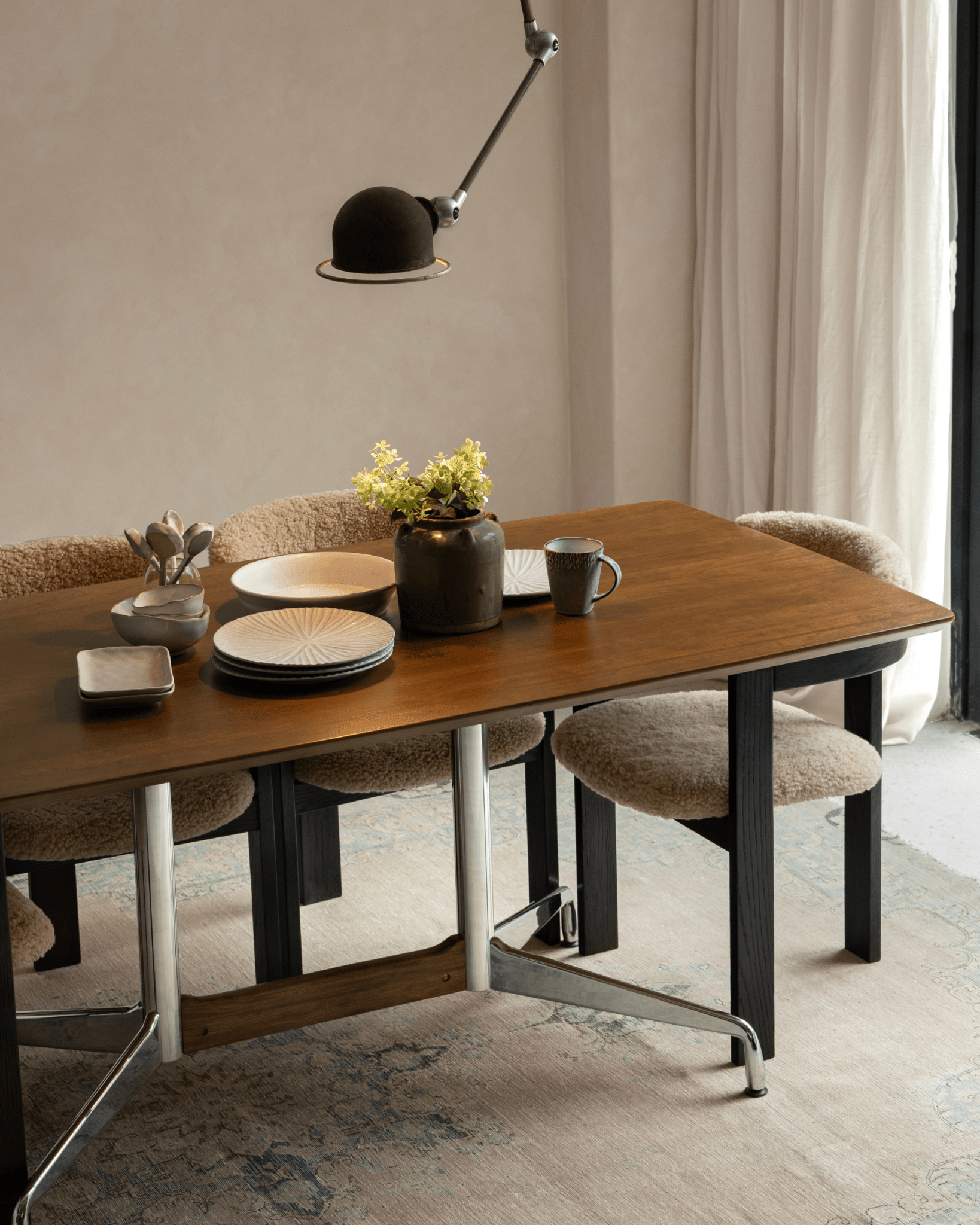 Eames Long Table with Burmese teak veneer top and stylish chairs, mid-century modern design dining room