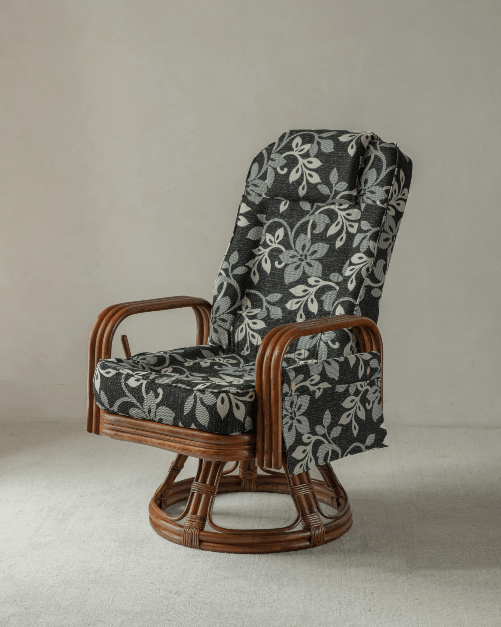 Willow Rattan Chair with floral cushion, Indonesian rattan frame, and modern design