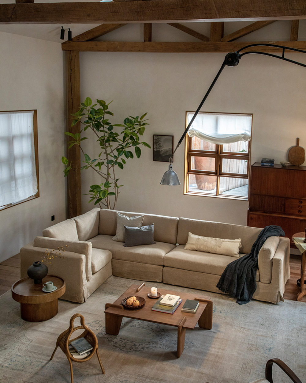 Beige linen Skirt Sectional Sofa in modern living room, modular design, relaxed atmosphere, customizable comfort