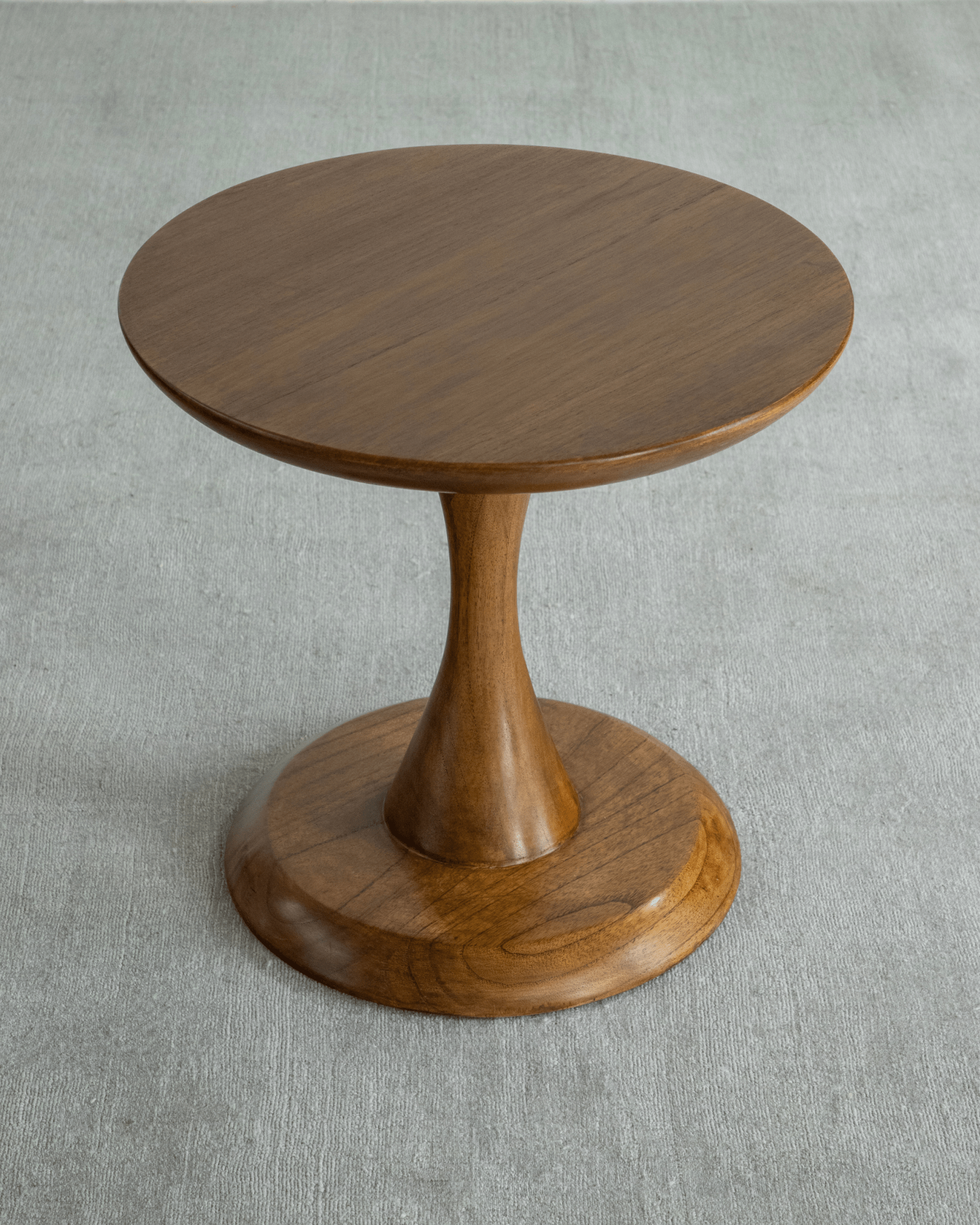 Spindle Side Table in solid teak wood with hourglass base, elegant and compact design