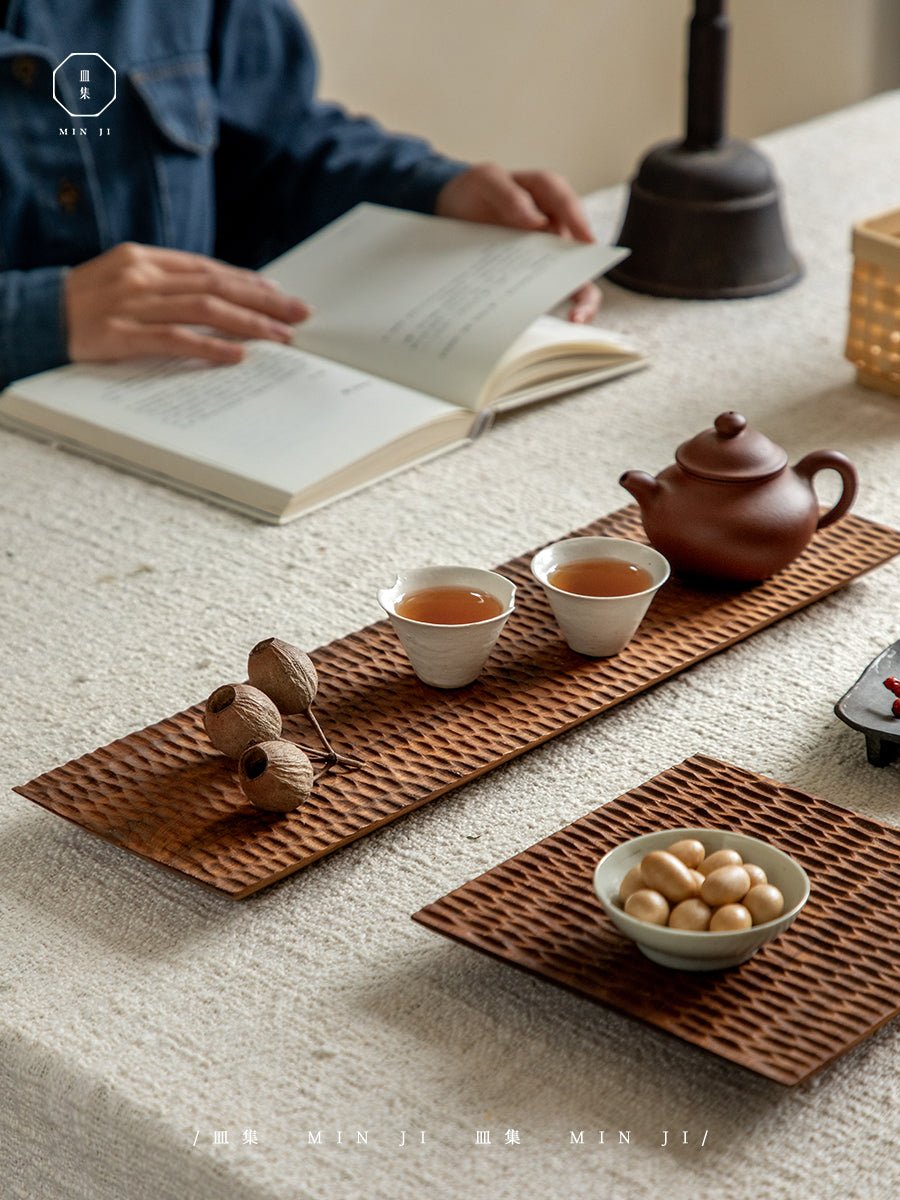 Hand-carved teak wood serving tray with tea setting, elegant artisan design