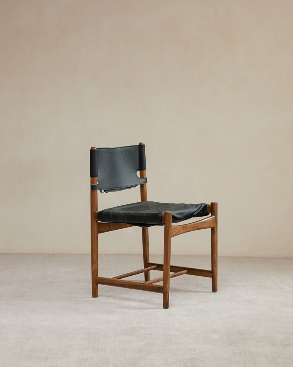 Spanish Dining Chair with black leather seat and teak wood frame, durable design