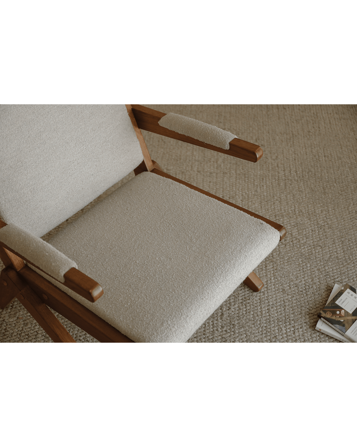 Scissors Chair in red oak with light grey fabric seat and unique scissor legs. Modern design for any interior.