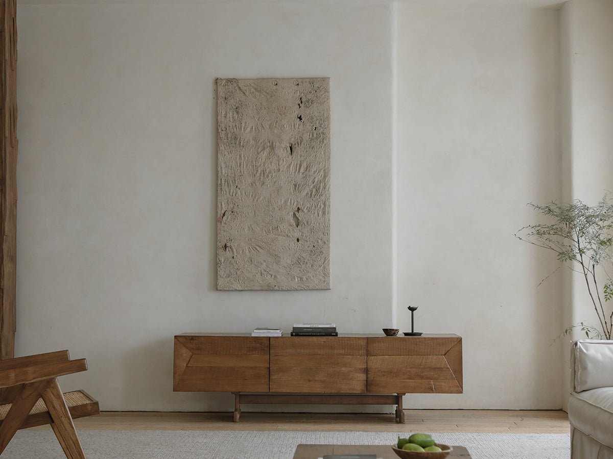 No.3 Sideboard in reclaimed wood with geometric panels, modern design, and natural elements in a room setting