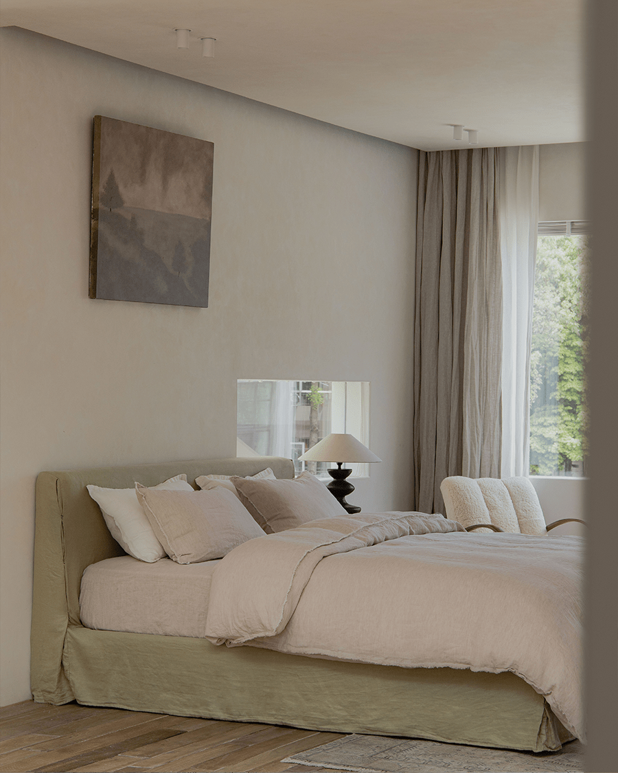 Freya Linen Bed in a serene bedroom setting, natural linen upholstery and neutral color bedding for peaceful sleep