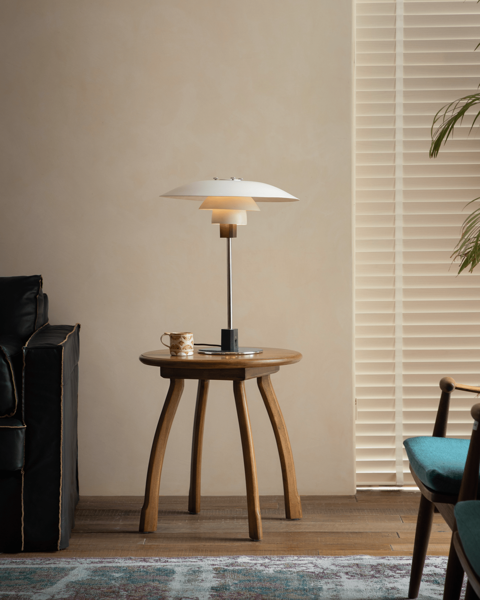 Ele Round Side Table with Lamp - Vintage Phoebe Wood Table with Unique Octopus Legs, perfect for any room.