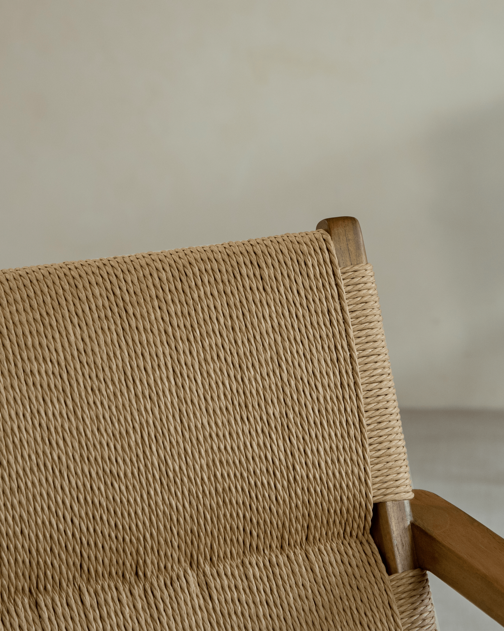 Louisa Chair detail: Natural fiber woven seat and teak frame, MCM design, perfect for study or dining.