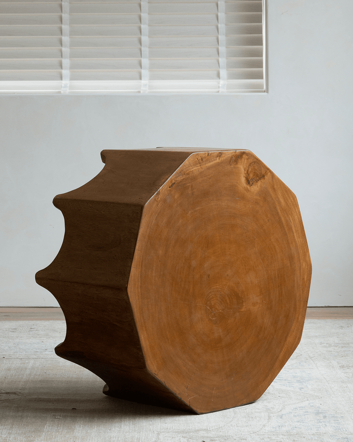 Decagon Side Table showcasing ten-sided design in a minimalist room with natural light