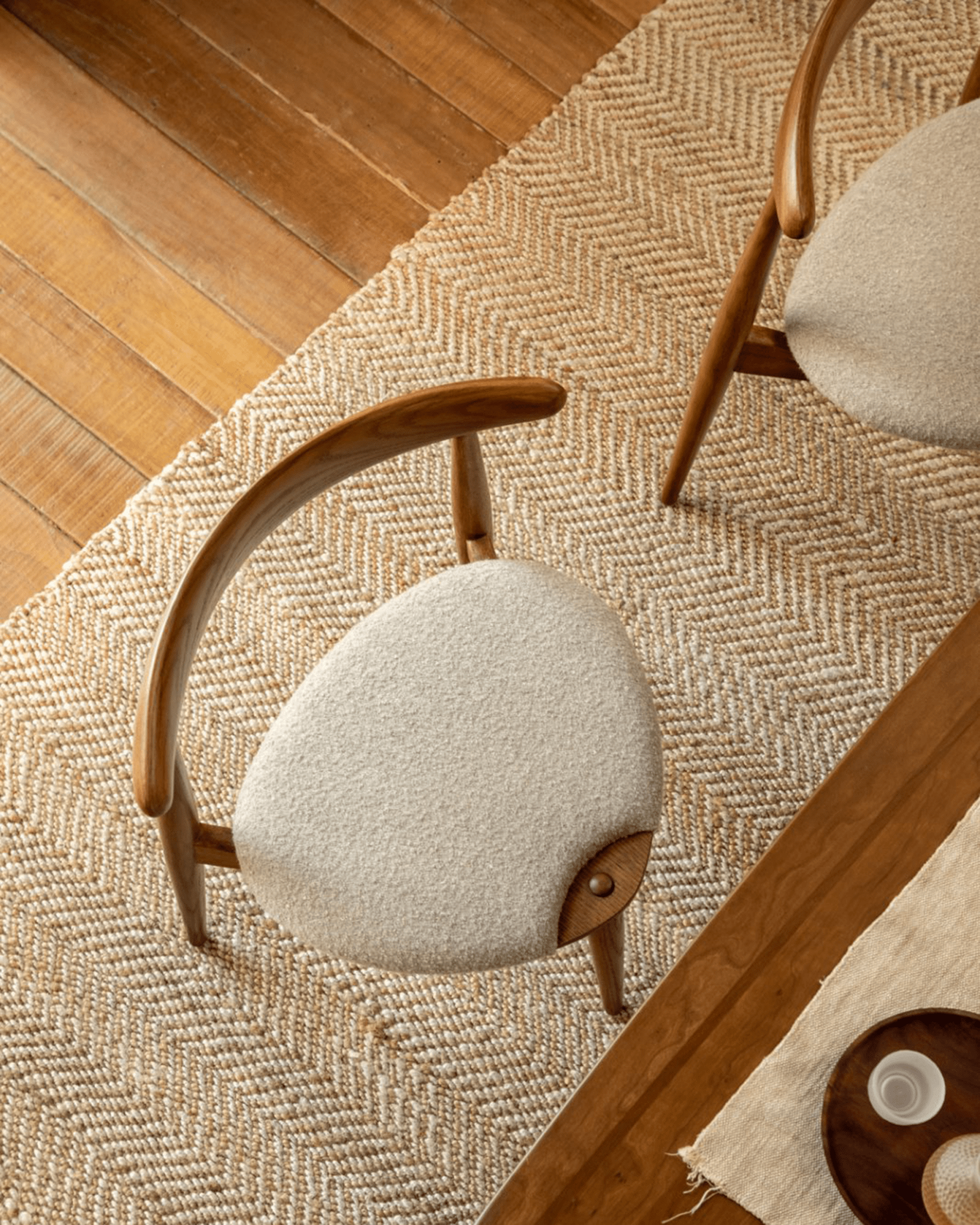 Heart Dining Chair in a stylish interior, bouclé seat and oak wood frame, Danish design