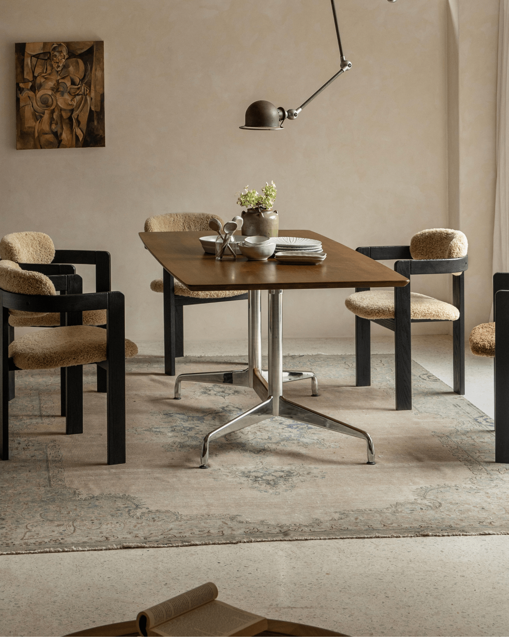 Eames desk with Burmese teak veneer top, modern design, stylish chairs, mid-century modern dining room.