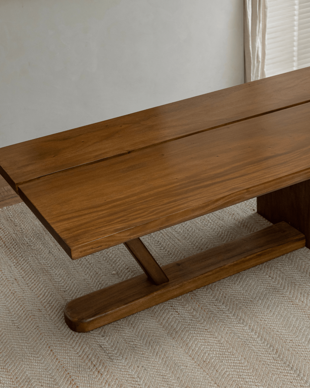 Sailboat desk with natural wood grain, elegant craftsmanship, Z-shaped leg and solid wood surface