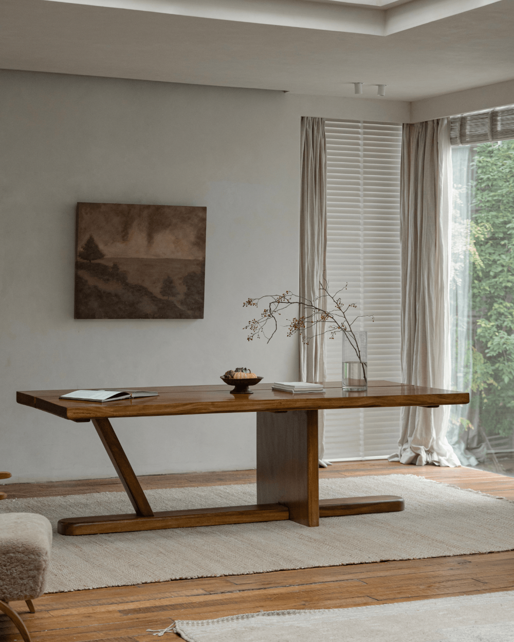 Sailboat Desk, solid wood desk with Z-shaped leg in modern interior, natural light, elegant craftsmanship