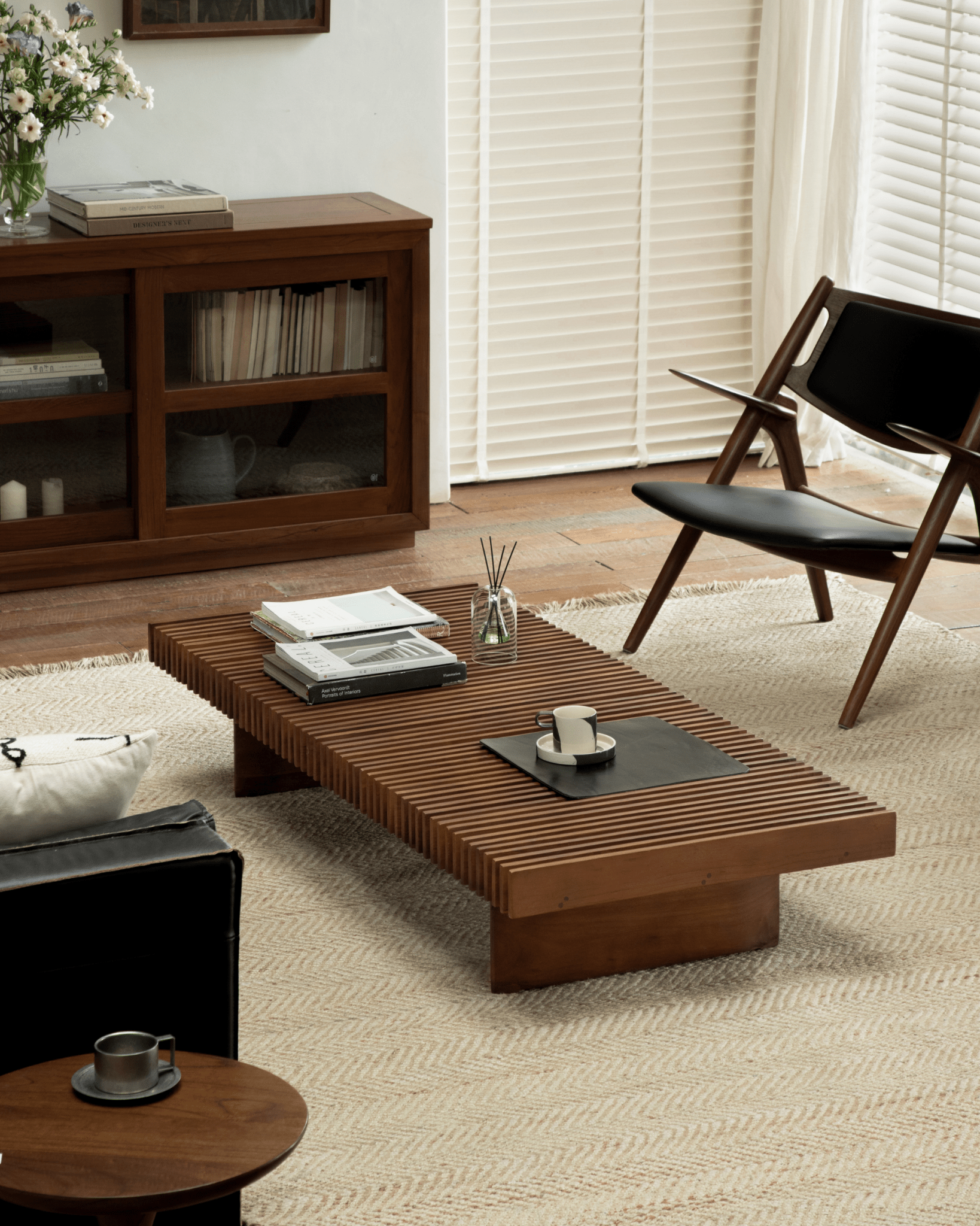 Riva Coffee Table in modern organic living room with teak wood slatted design