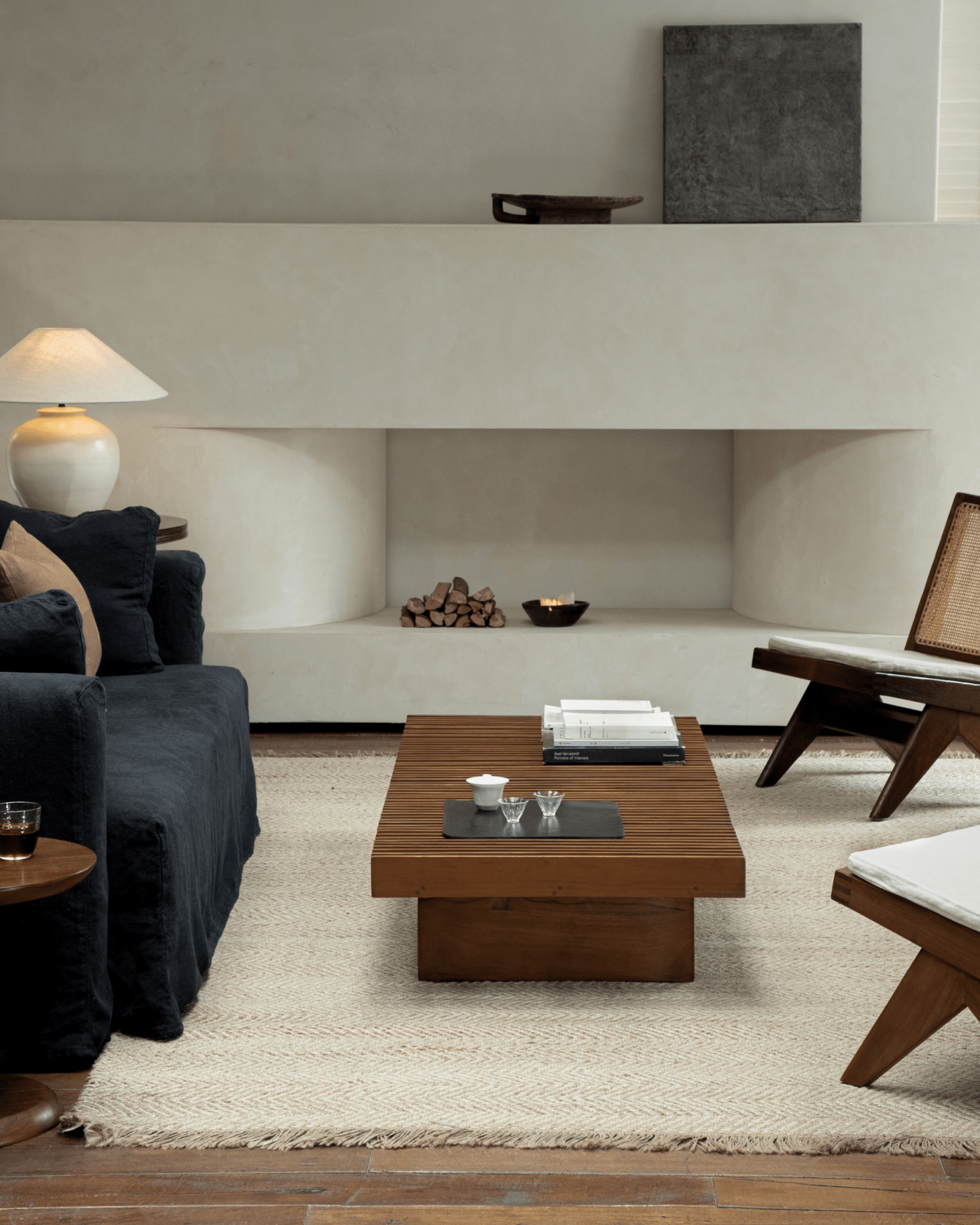 Riva Coffee Table in a modern organic living room setting. Solid teak wood slatted design