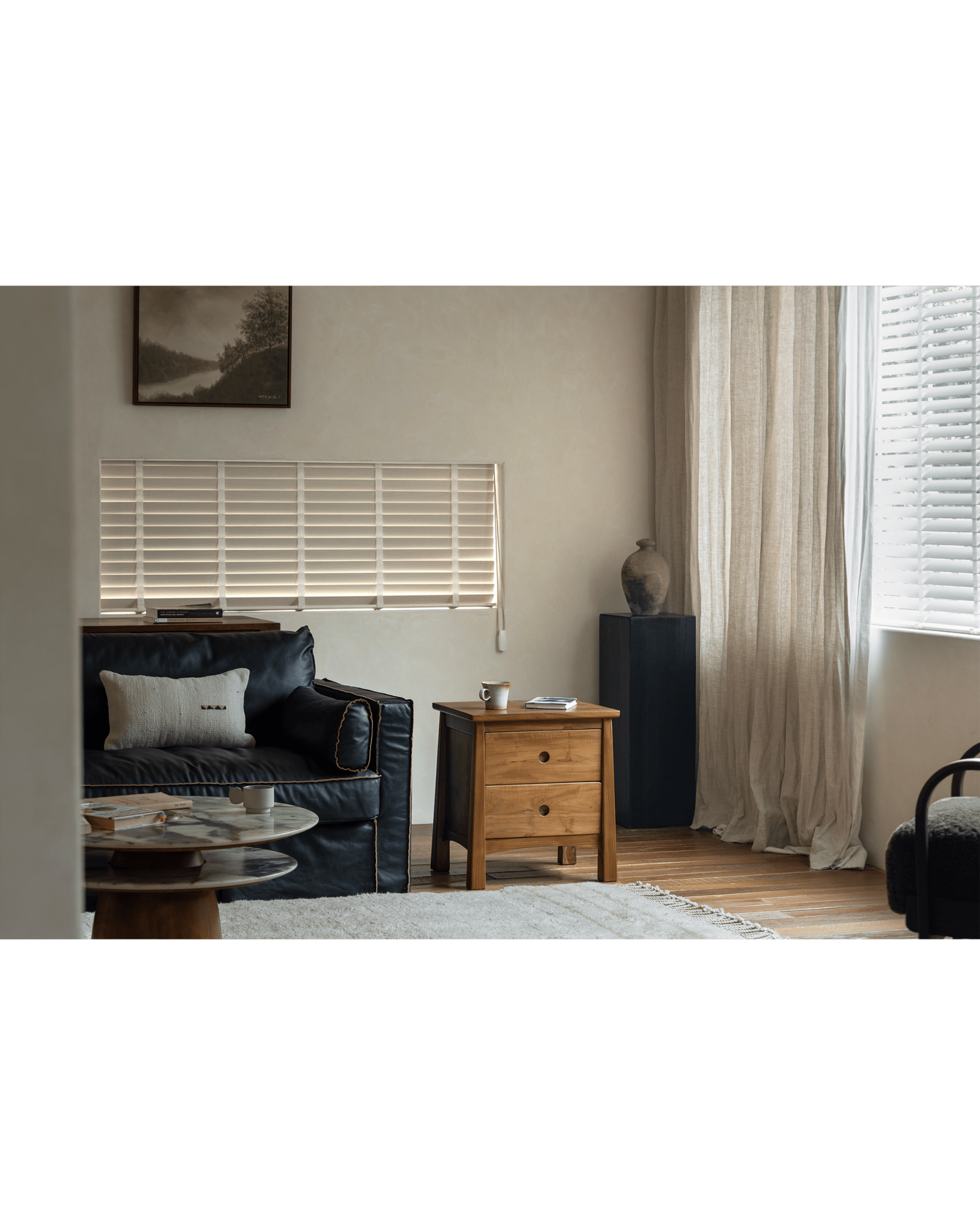 ZM Home Astral Nightstand in a living room setting with sofa and decor, wooden bedside table.