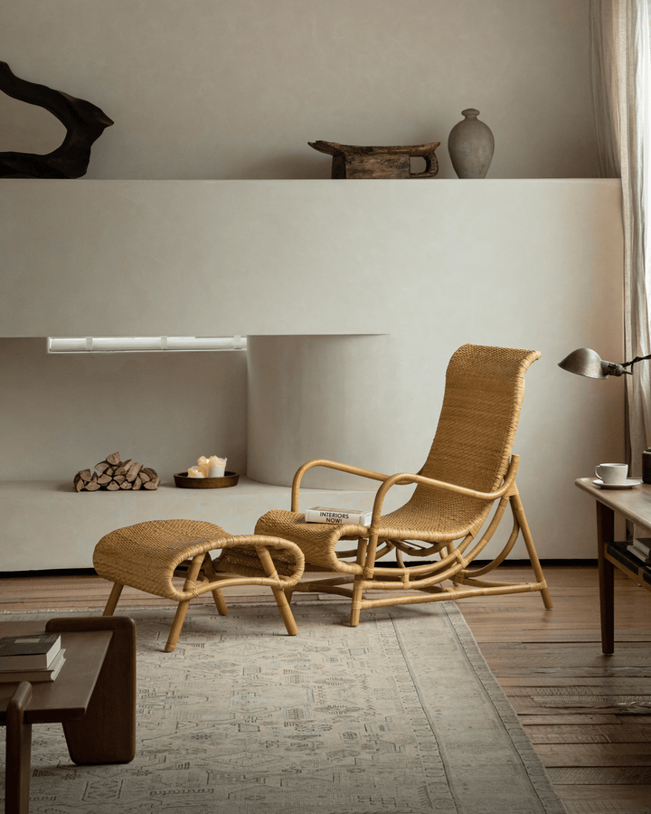 Nalgae rattan lounge chair and footstool in a serene, stylish living room